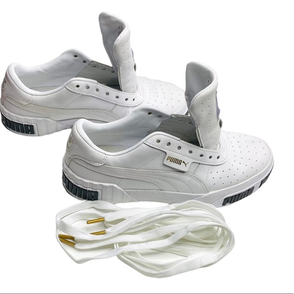 Puma Shoes: White with gold logo and shoe strings. Original box not available. - Picture 2 of 4